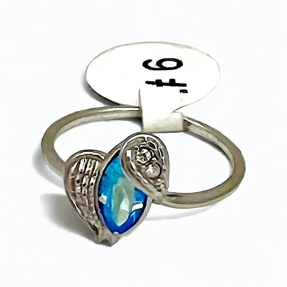 Blue Zircon gem ring by Fragrant Jewels. Silver rhodium wings with clear sparkly - Picture 1 of 3